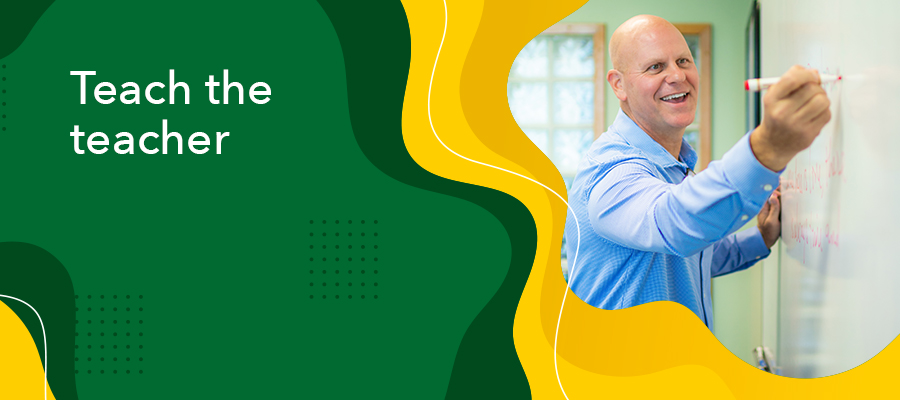 Teach the teacher Photo of a teacher writing something on a white board